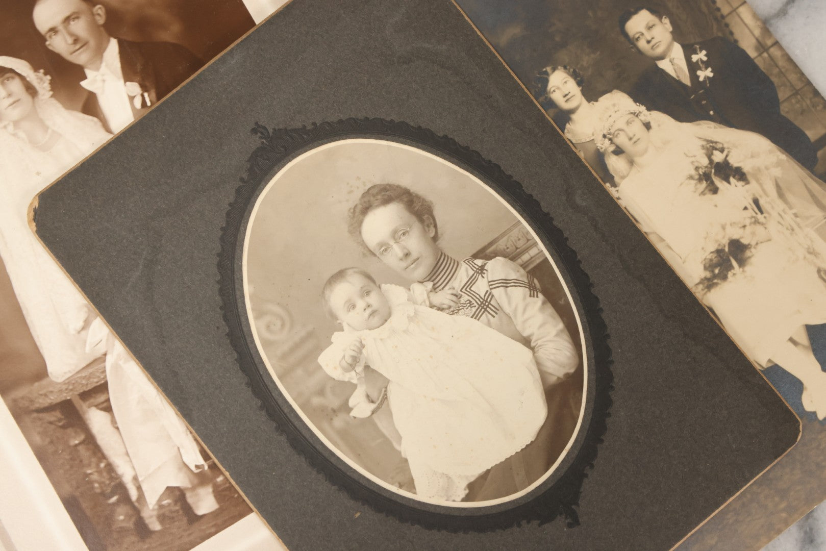 Lot 177 - Grouping Of Twelve Antique Photographs, Mostly Boarded, Including Wedding, Children, And Women Portraits, Circa 1880–1900