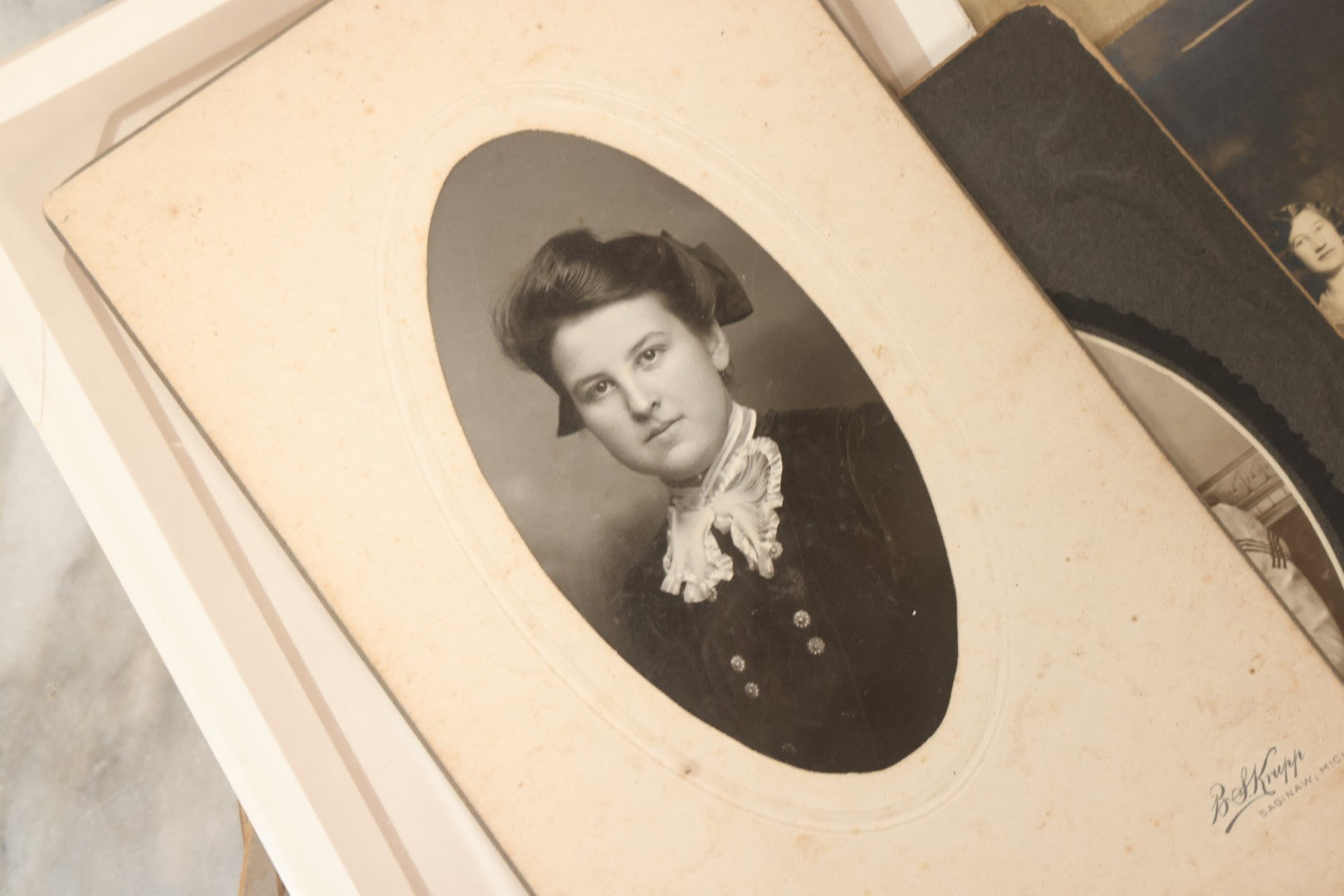 Lot 177 - Grouping Of Twelve Antique Photographs, Mostly Boarded, Including Wedding, Children, And Women Portraits, Circa 1880–1900
