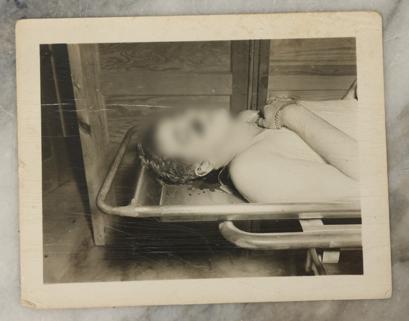 Lot 178 - Grouping Of Three Vintage World War II Snapshot Photographs Depicting Deceased Soldiers With Combat Injuries — Content Warning: Graphic Wartime Imagery