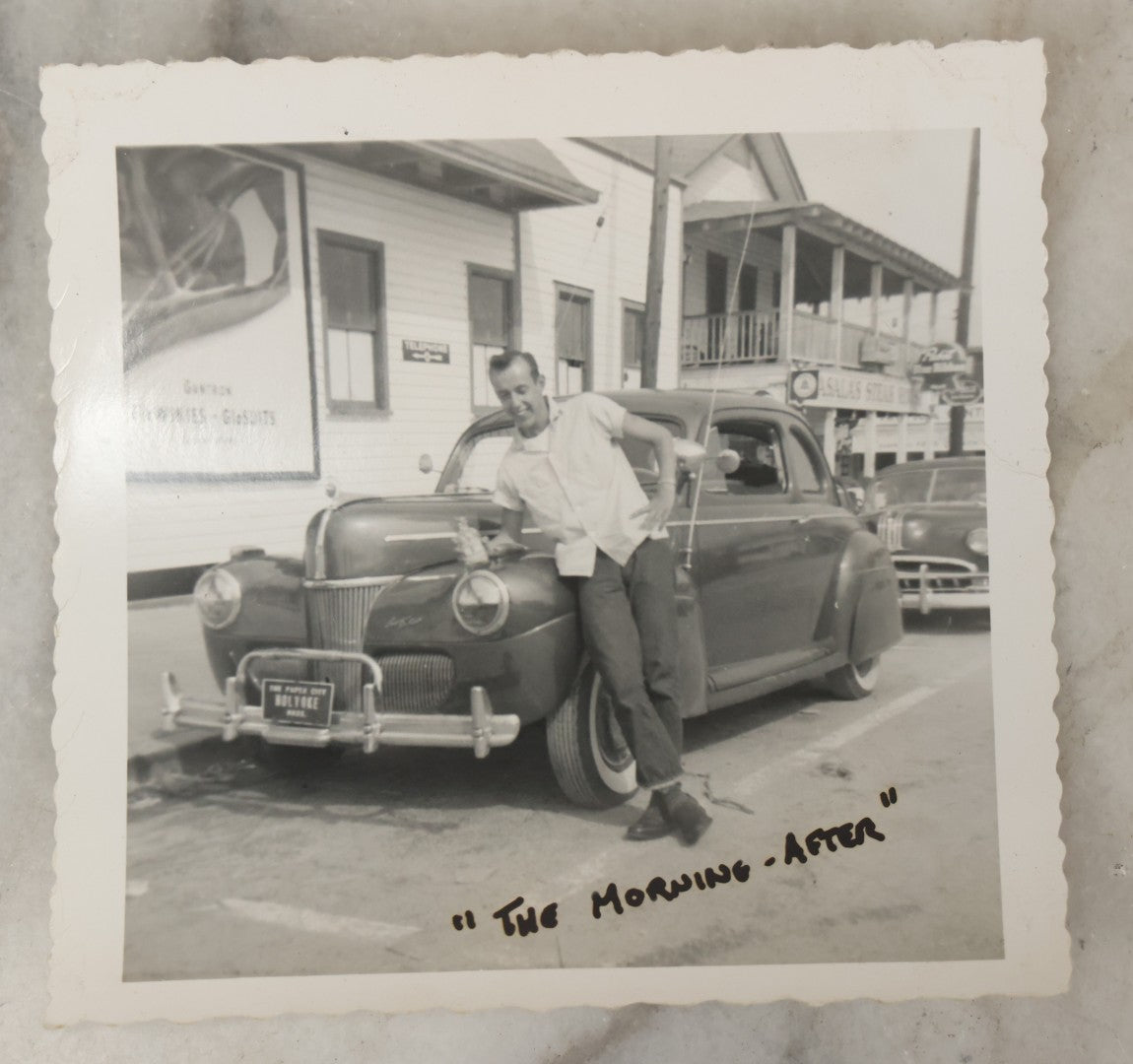 Lot 183 - Grouping Of Four Vintage Automotive Snapshot Photographs Including "The Morning After" At Folly Beach, South Carolina, 1954, And Cushman's Delivery Service Step Van Before And After Collision