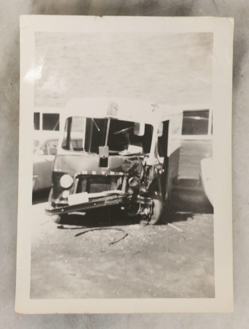 Lot 183 - Grouping Of Four Vintage Automotive Snapshot Photographs Including "The Morning After" At Folly Beach, South Carolina, 1954, And Cushman's Delivery Service Step Van Before And After Collision