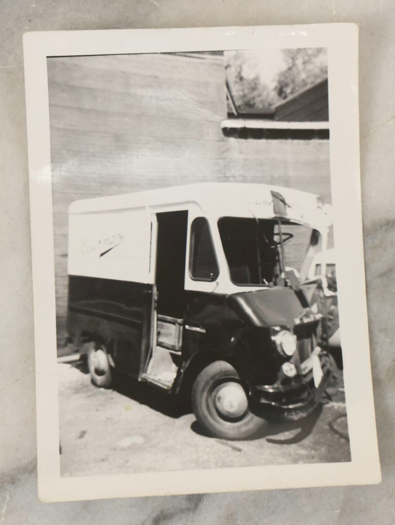 Lot 183 - Grouping Of Four Vintage Automotive Snapshot Photographs Including "The Morning After" At Folly Beach, South Carolina, 1954, And Cushman's Delivery Service Step Van Before And After Collision