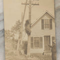 Lot 186 - Antique Real Photo Postcard RPPC “Trained Bear, Weare, New Hampshire” Depicting Man And Climbing Bear Beside House