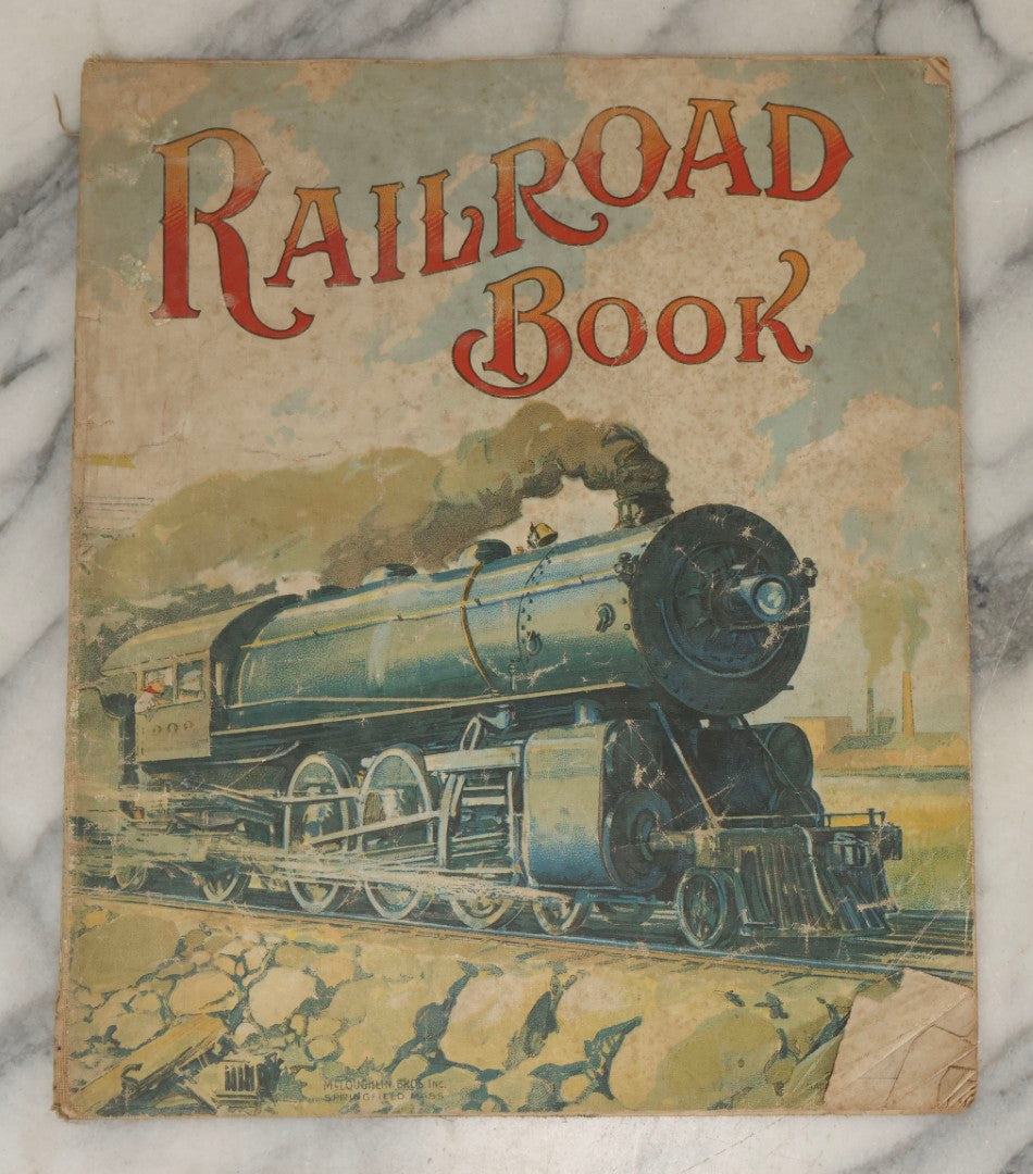 Lot 203 - Grouping Of 3 Antique And Vintage Industrial-Themed Children's Books Including “Railroad Book” By McLoughlin Bros., “Book Of Trains” By Grif Teller, And “Oil Comes To Us” By Rose Wyler And Warren W. McSpadden
