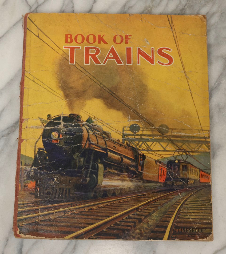 Lot 203 - Grouping Of 3 Antique And Vintage Industrial-Themed Children's Books Including “Railroad Book” By McLoughlin Bros., “Book Of Trains” By Grif Teller, And “Oil Comes To Us” By Rose Wyler And Warren W. McSpadden
