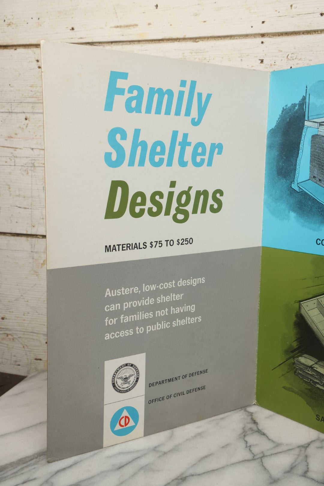 Lot 204 - Vintage 1963 U.S. Government Civil Defense “Public Shelter Designs” Fold-Out Poster, Office Of Civil Defense, Fallout Shelter Program, 48" x 18"