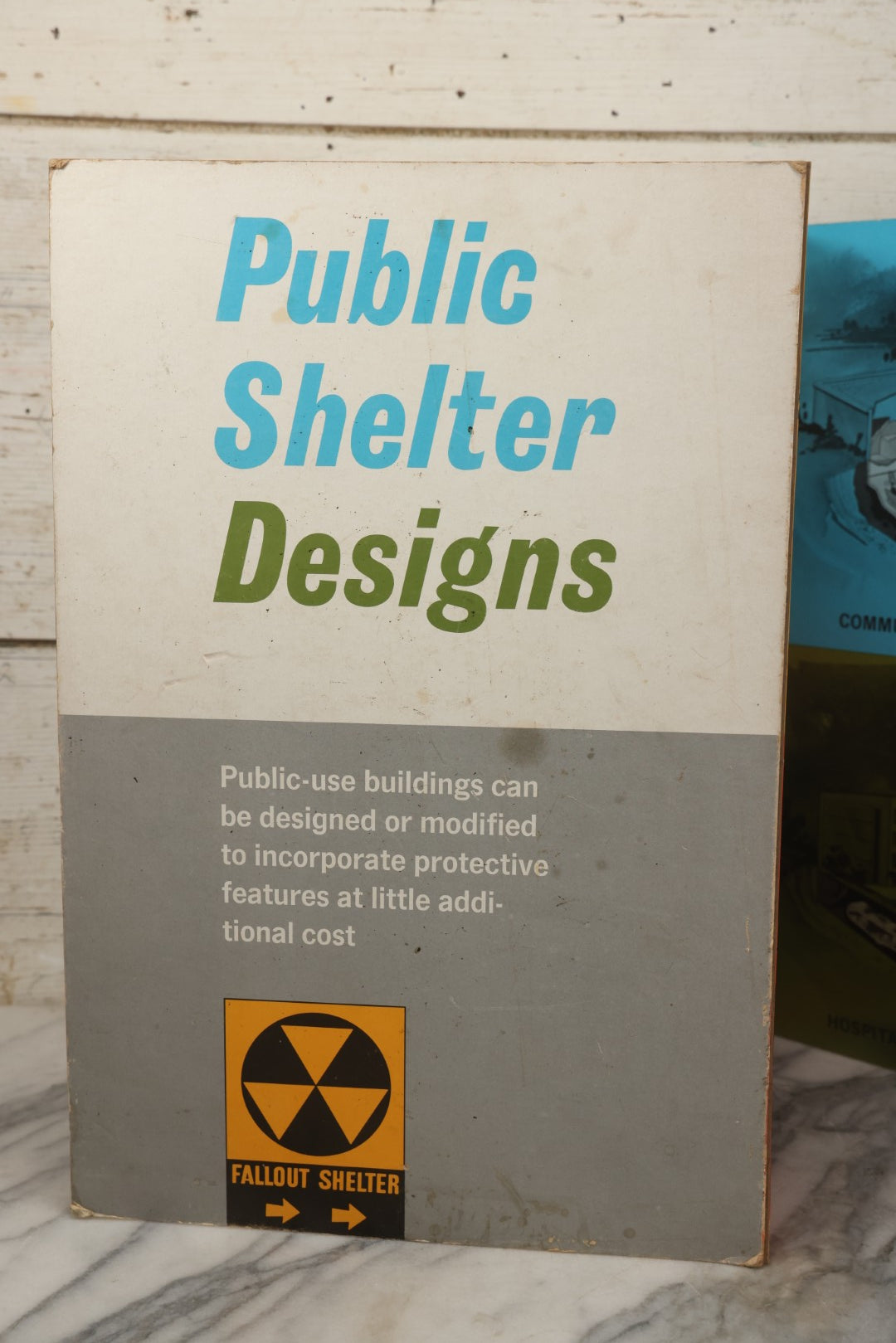 Lot 204 - Vintage 1963 U.S. Government Civil Defense “Public Shelter Designs” Fold-Out Poster, Office Of Civil Defense, Fallout Shelter Program, 48" x 18"