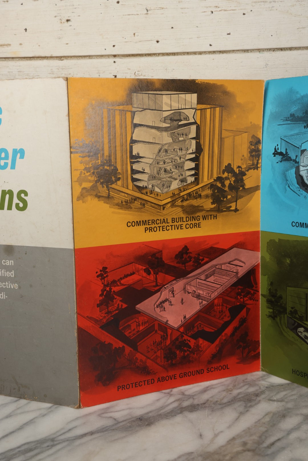 Lot 204 - Vintage 1963 U.S. Government Civil Defense “Public Shelter Designs” Fold-Out Poster, Office Of Civil Defense, Fallout Shelter Program, 48" x 18"