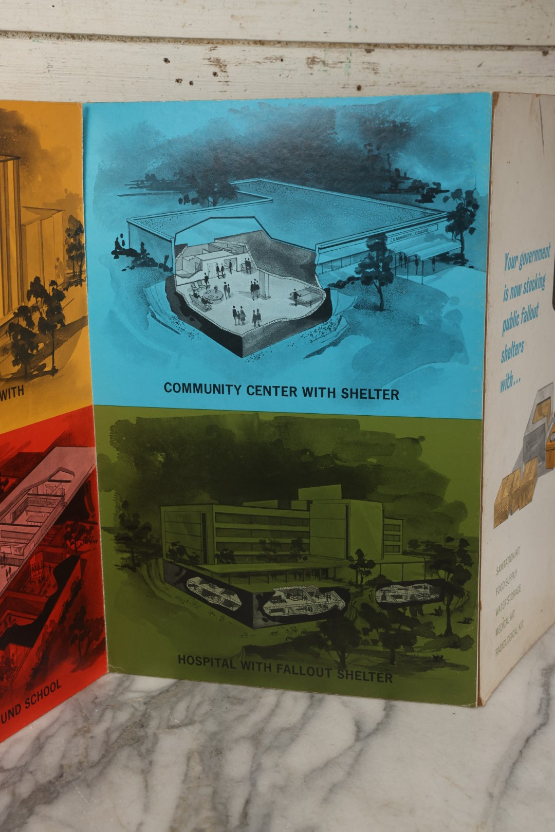 Lot 204 - Vintage 1963 U.S. Government Civil Defense “Public Shelter Designs” Fold-Out Poster, Office Of Civil Defense, Fallout Shelter Program, 48" x 18"