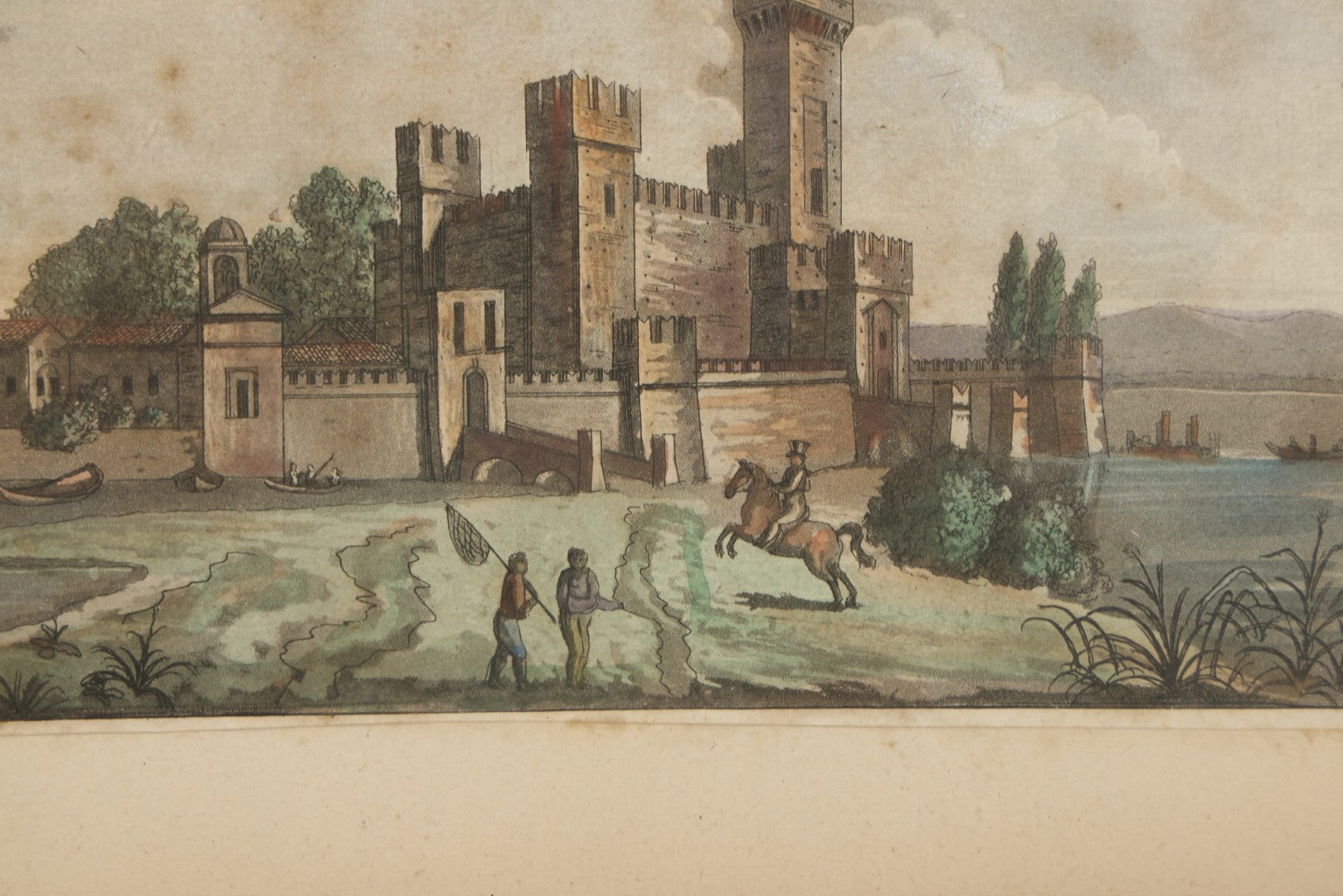 Lot 223 - Antique Hand-Colored Engraving Scaligera Castle, Sirmione, Lake Garda, Italy, Circa Early 19th Century, Mounted Behind Glass With Backing Board And Sealing Tape Border