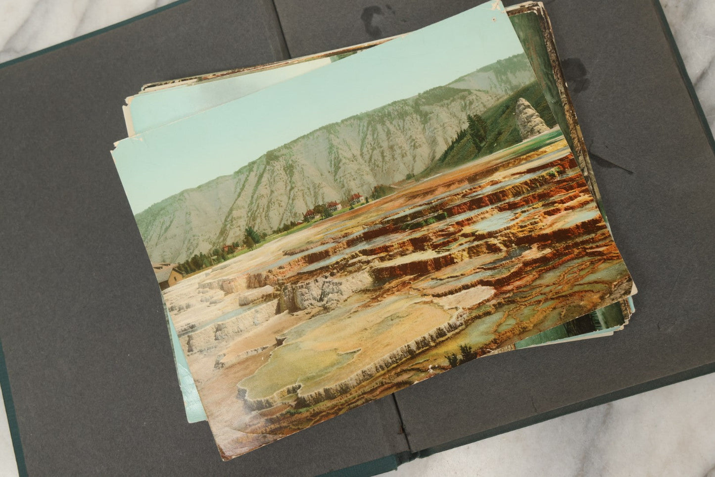 Lot 238 - Antique “Postal Cards” Scrapbook Album Containing Yellowstone Photographs, Postcards, And Ephemera Including Large-Format 1898–1902 Prints By Detroit Photographic Co., Ward's Postal Card Album, Boston, Massachusetts