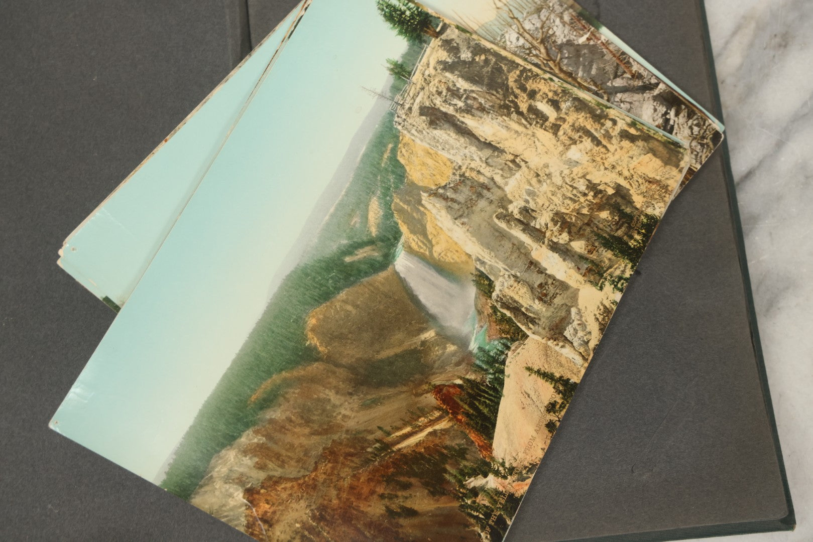 Lot 238 - Antique “Postal Cards” Scrapbook Album Containing Yellowstone Photographs, Postcards, And Ephemera Including Large-Format 1898–1902 Prints By Detroit Photographic Co., Ward's Postal Card Album, Boston, Massachusetts