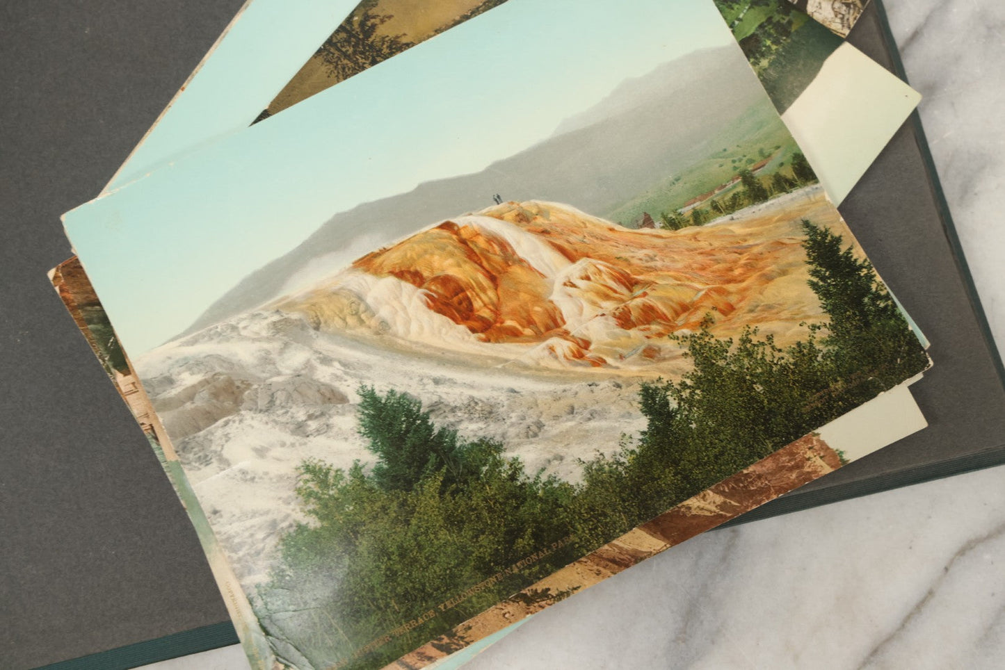 Lot 238 - Antique “Postal Cards” Scrapbook Album Containing Yellowstone Photographs, Postcards, And Ephemera Including Large-Format 1898–1902 Prints By Detroit Photographic Co., Ward's Postal Card Album, Boston, Massachusetts