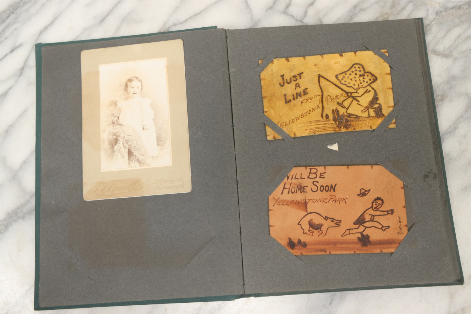 Lot 238 - Antique “Postal Cards” Scrapbook Album Containing Yellowstone Photographs, Postcards, And Ephemera Including Large-Format 1898–1902 Prints By Detroit Photographic Co., Ward's Postal Card Album, Boston, Massachusetts