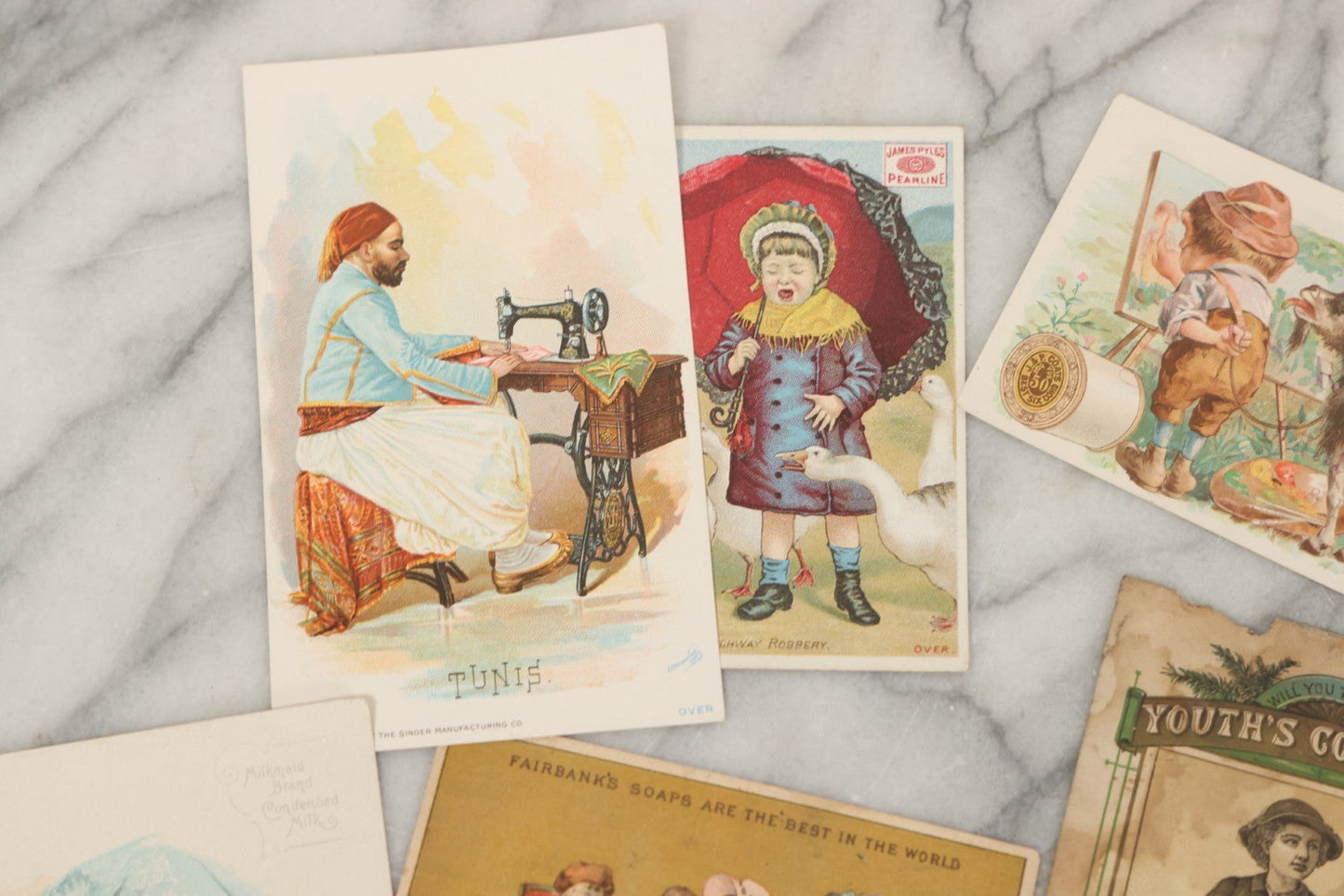 Lot 241 - Grouping Of 15 Antique Victorian Lithographed Trade Card Advertisements Including J. & P. Coates Thread, Milkmaid Brand Condensed Milk, Henkel's Baking Powder, Boston Brass Andirons, Fairbanks Soap, And Singer Manufacturing Co. Sewing Machines
