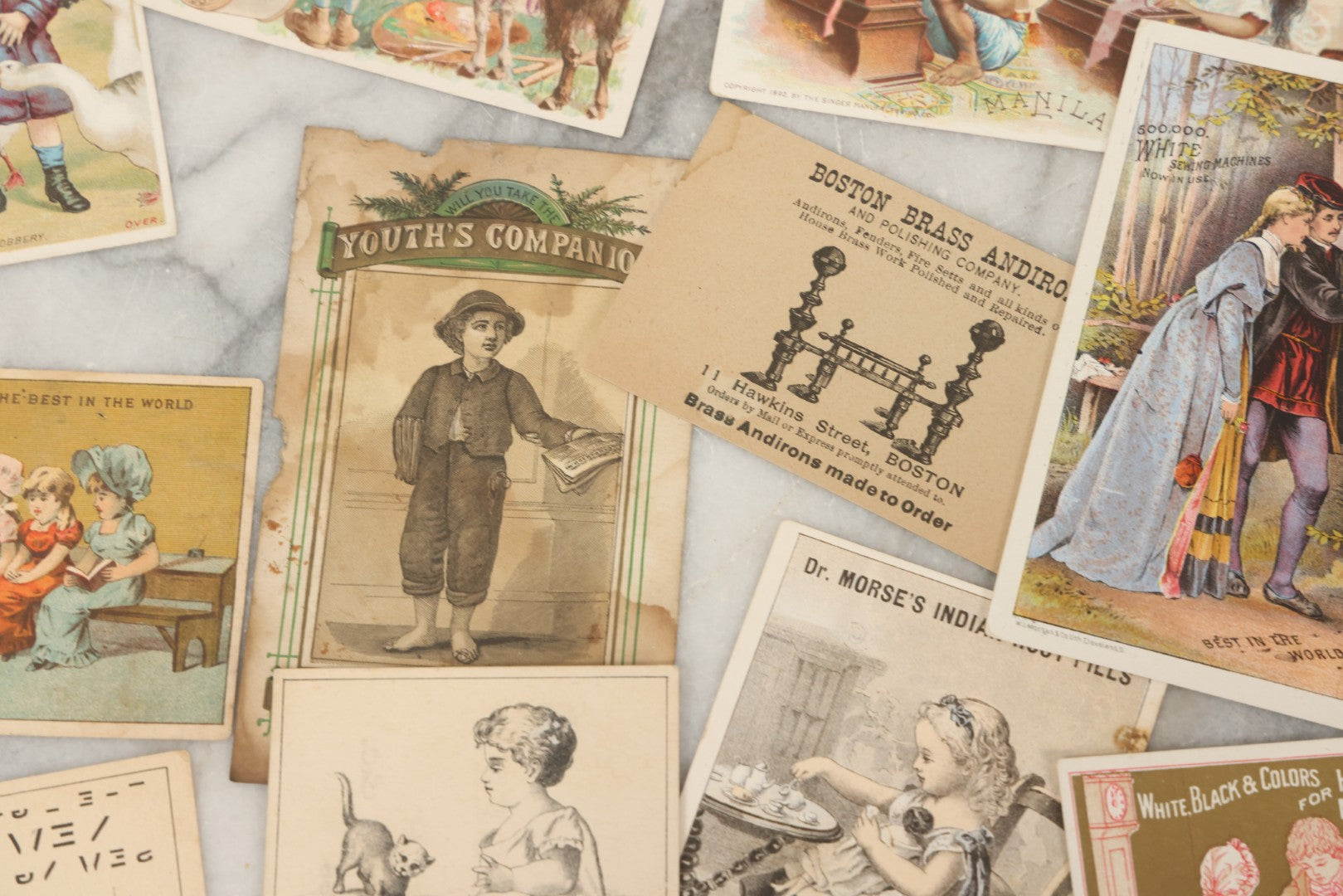 Lot 241 - Grouping Of 15 Antique Victorian Lithographed Trade Card Advertisements Including J. & P. Coates Thread, Milkmaid Brand Condensed Milk, Henkel's Baking Powder, Boston Brass Andirons, Fairbanks Soap, And Singer Manufacturing Co. Sewing Machines