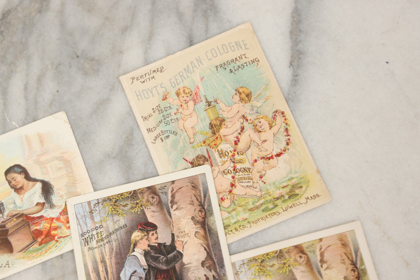 Lot 241 - Grouping Of 15 Antique Victorian Lithographed Trade Card Advertisements Including J. & P. Coates Thread, Milkmaid Brand Condensed Milk, Henkel's Baking Powder, Boston Brass Andirons, Fairbanks Soap, And Singer Manufacturing Co. Sewing Machines