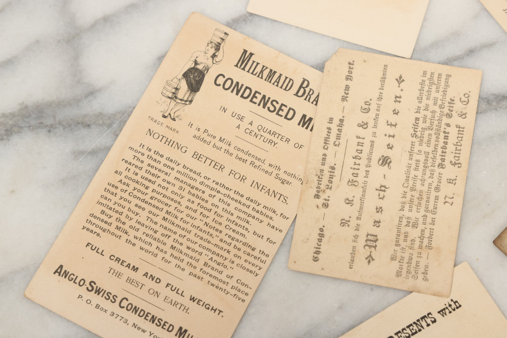 Lot 241 - Grouping Of 15 Antique Victorian Lithographed Trade Card Advertisements Including J. & P. Coates Thread, Milkmaid Brand Condensed Milk, Henkel's Baking Powder, Boston Brass Andirons, Fairbanks Soap, And Singer Manufacturing Co. Sewing Machines