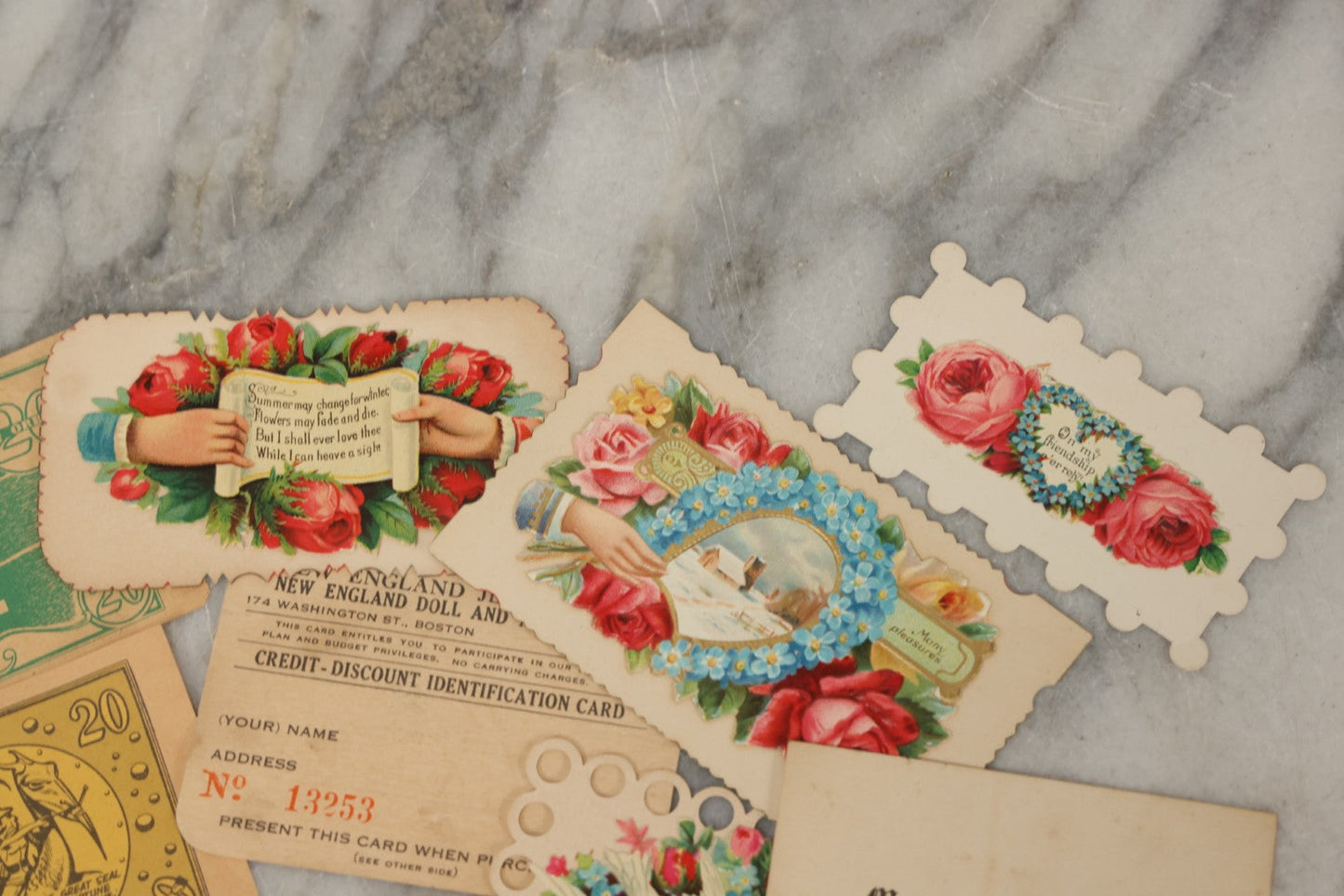 Lot 242 - Grouping Of 15 Antique And Vintage Mixed Ephemera Scraps Including Novelty Space Money From Neptune, 1882 Award Of Merit, Hand Motif Calling Cards, New England Jewelry Co. Coupon, Cat Booklet, Yellowstone Decal, And Erma EP22 Pistol Booklet