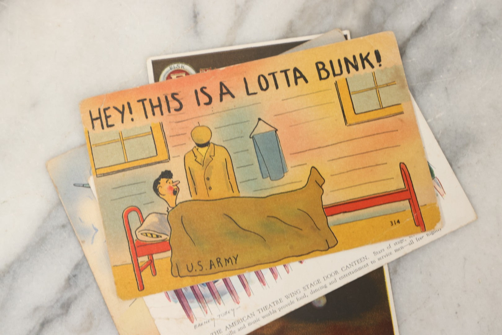 Lot 243 - Grouping Of 15 Antique And Vintage Postcards Including Fisk Tires And Shasta Water Advertising, Douglas Fairbanks Movie Promotion, Early Reno Undivided Back, Mythological Subjects, And Wwii Comic Cards
