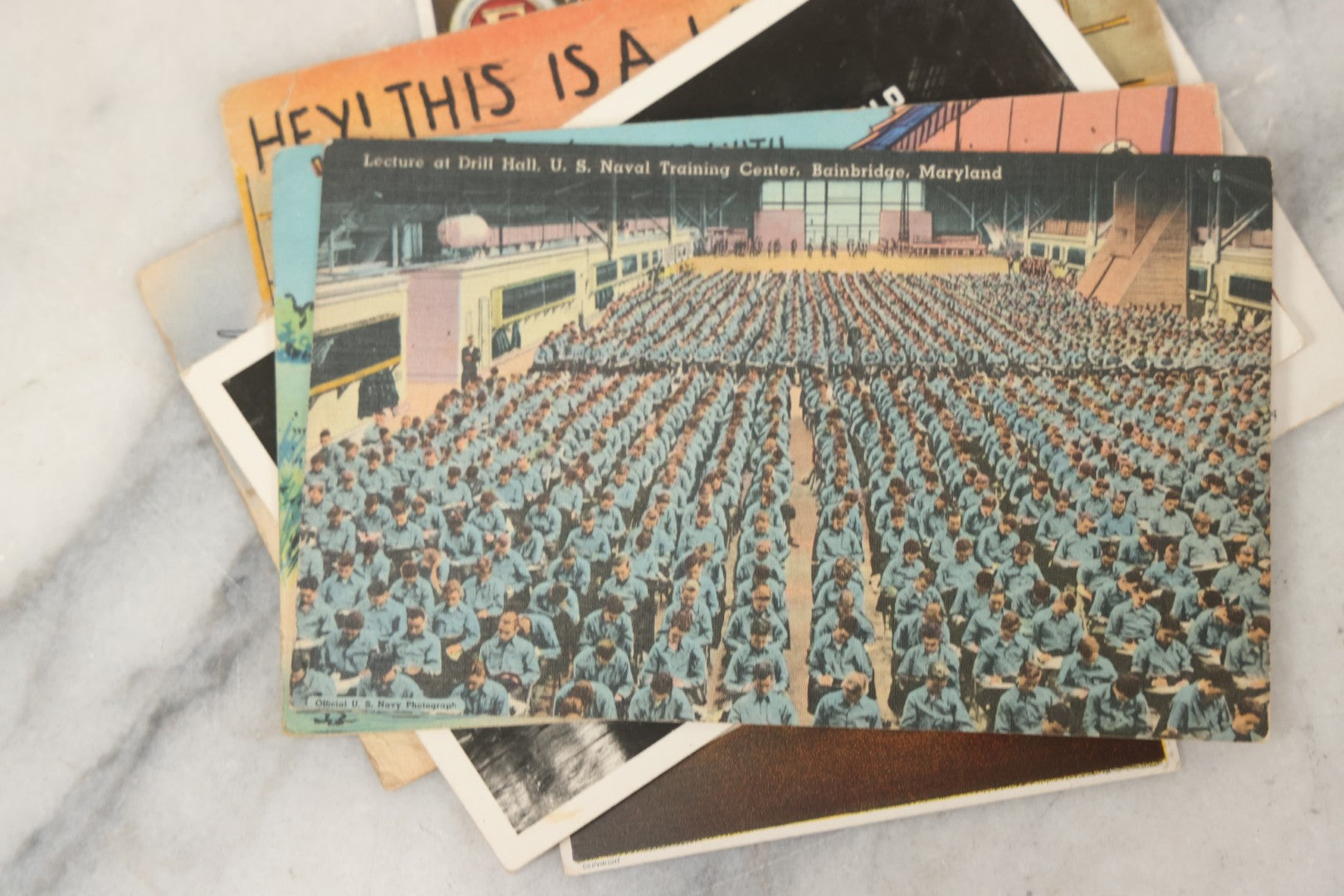 Lot 243 - Grouping Of 15 Antique And Vintage Postcards Including Fisk Tires And Shasta Water Advertising, Douglas Fairbanks Movie Promotion, Early Reno Undivided Back, Mythological Subjects, And Wwii Comic Cards