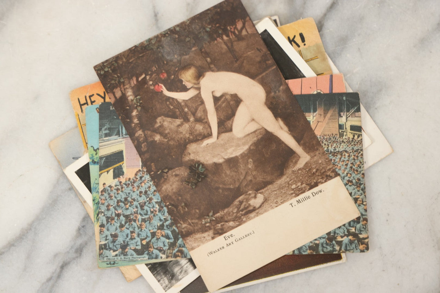 Lot 243 - Grouping Of 15 Antique And Vintage Postcards Including Fisk Tires And Shasta Water Advertising, Douglas Fairbanks Movie Promotion, Early Reno Undivided Back, Mythological Subjects, And Wwii Comic Cards
