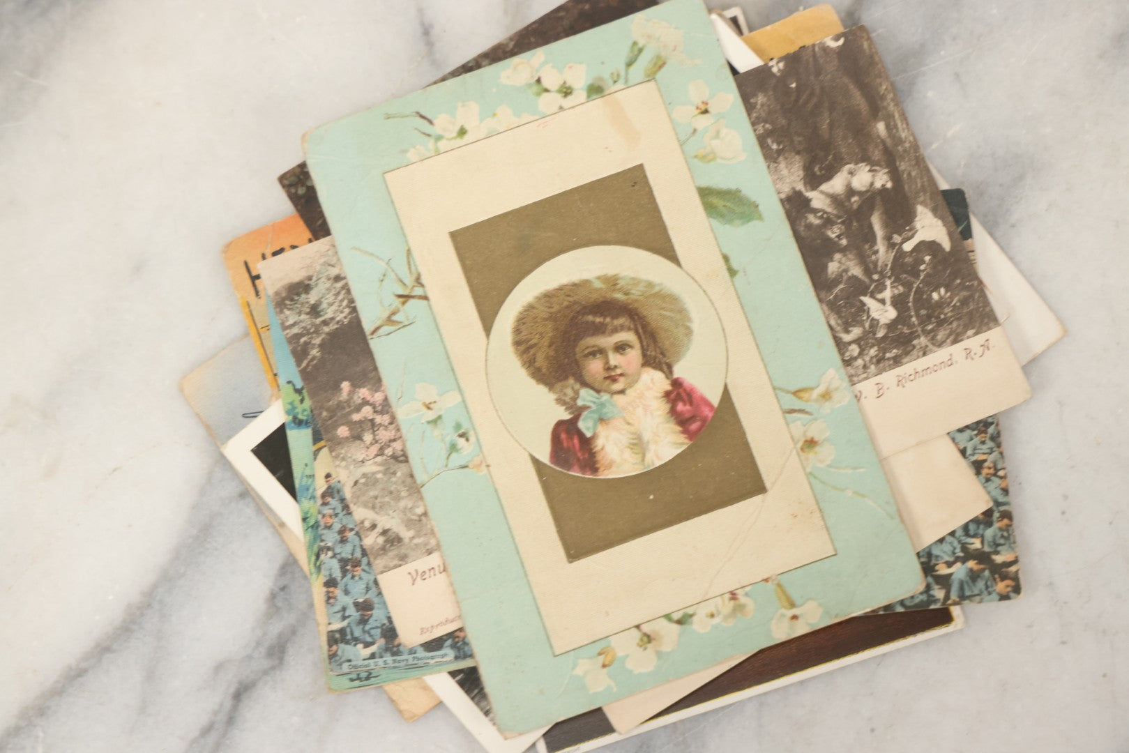 Lot 243 - Grouping Of 15 Antique And Vintage Postcards Including Fisk Tires And Shasta Water Advertising, Douglas Fairbanks Movie Promotion, Early Reno Undivided Back, Mythological Subjects, And Wwii Comic Cards