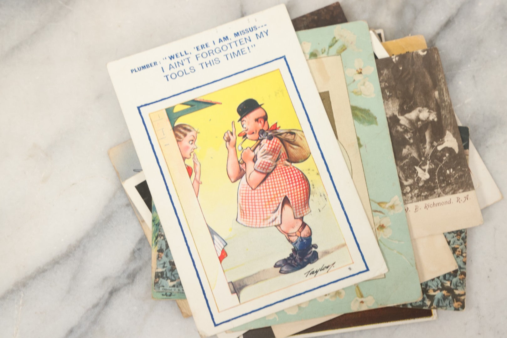 Lot 243 - Grouping Of 15 Antique And Vintage Postcards Including Fisk Tires And Shasta Water Advertising, Douglas Fairbanks Movie Promotion, Early Reno Undivided Back, Mythological Subjects, And Wwii Comic Cards
