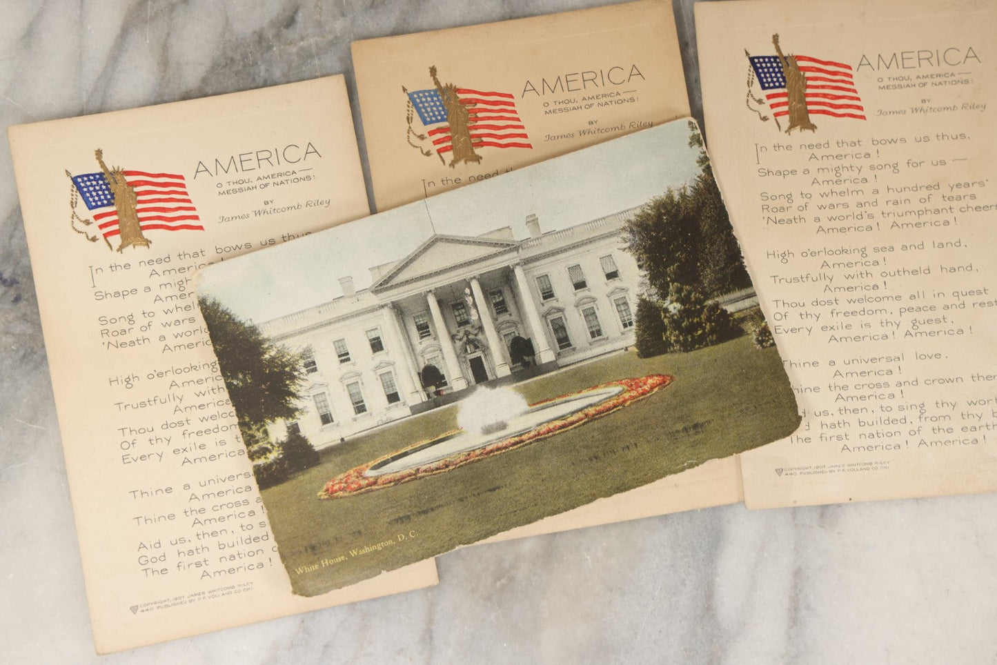 Lot 246 - Grouping Of Seven Antique And Vintage Patriotic Postcards, Including Three Copies Of "America" Poem By James Whitcomb Riley With Gilt Embossed Statue Of Liberty, Copyright 1907, Published By P.F. Volland & Co., Chicago, USA.