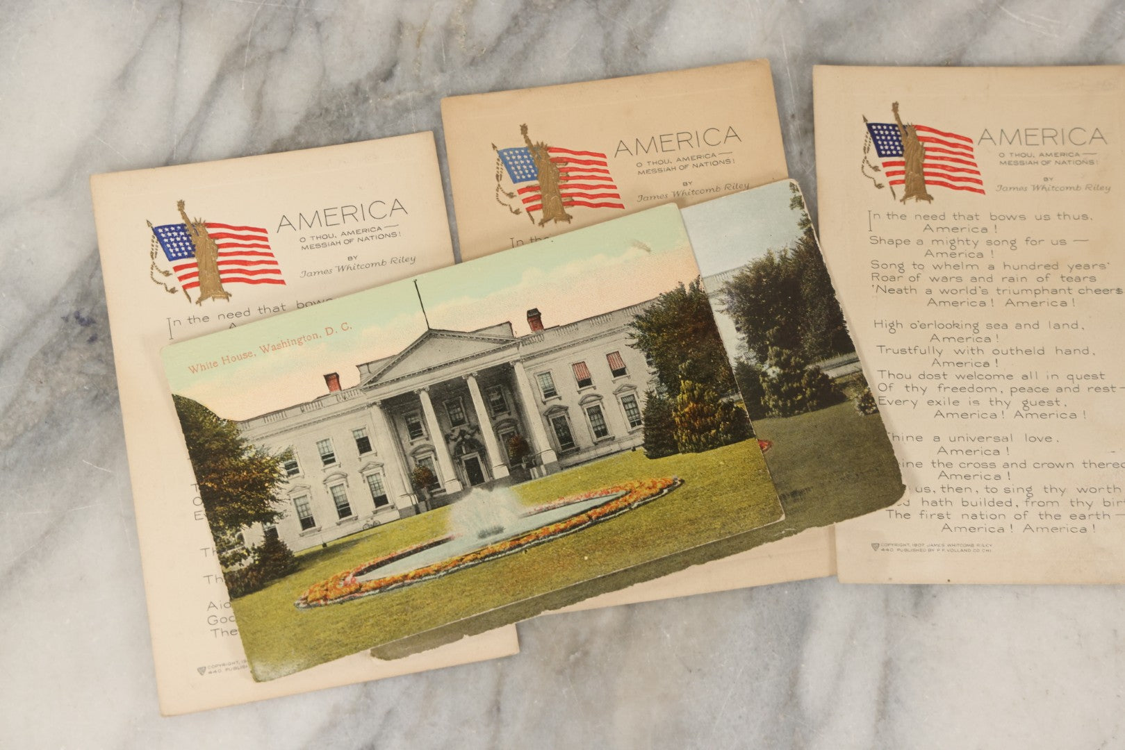 Lot 246 - Grouping Of Seven Antique And Vintage Patriotic Postcards, Including Three Copies Of "America" Poem By James Whitcomb Riley With Gilt Embossed Statue Of Liberty, Copyright 1907, Published By P.F. Volland & Co., Chicago, USA.