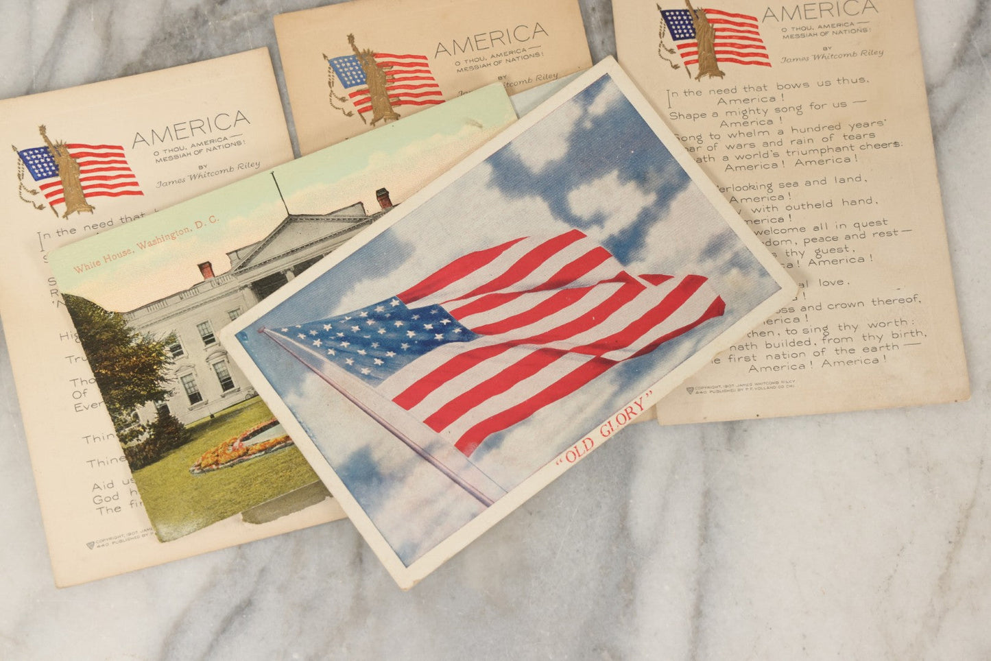 Lot 246 - Grouping Of Seven Antique And Vintage Patriotic Postcards, Including Three Copies Of "America" Poem By James Whitcomb Riley With Gilt Embossed Statue Of Liberty, Copyright 1907, Published By P.F. Volland & Co., Chicago, USA.