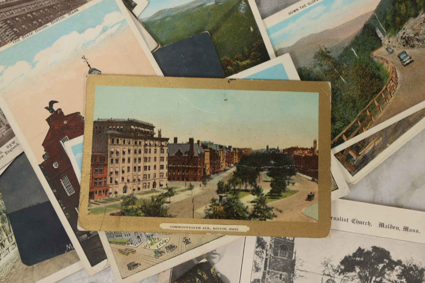 Lot 249 - Grouping Of Antique Souvenir Folders Of Mohawk Trail, Massachusetts, Springfield, Massachusetts, Gloucester, Massachusetts, And 34 Antique Postcards Of Massachusetts And Boston Buildings And Views