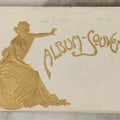 Lot 252 - Antique Souvenir Postcard Album “Album-Souvenir” With Embossed Gilt Cover Nude Woman On Globe, Containing Twenty Perforated Postcards Of Lyon, France