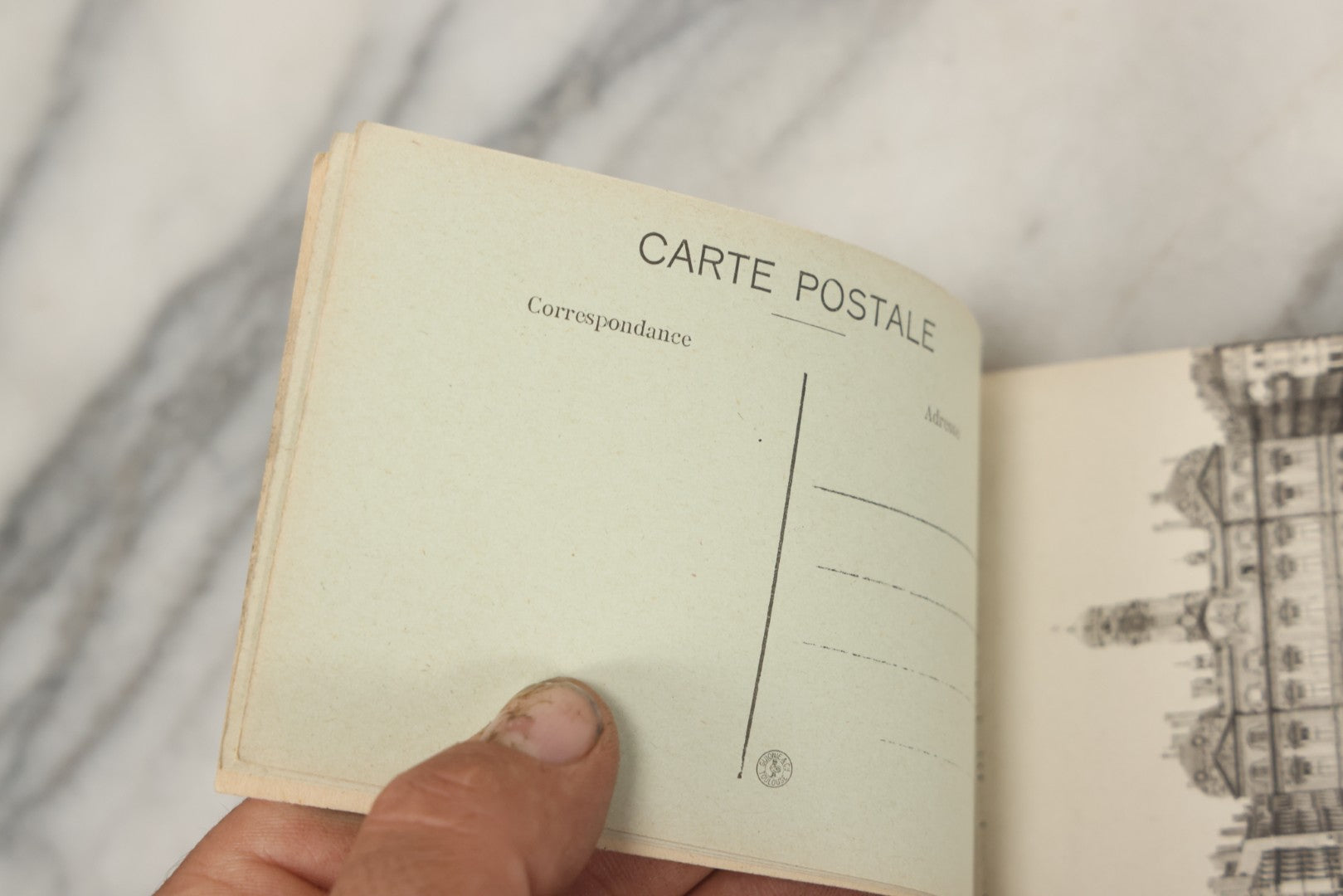 Lot 252 - Antique Souvenir Postcard Album “Album-Souvenir” With Embossed Gilt Cover Nude Woman On Globe, Containing Twenty Perforated Postcards Of Lyon, France