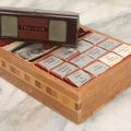 Lot 263 - Vintage Tru-Vue Bakelite Stereoscope Stereoviewer With 12 Film Strips Including Ringling Bros., New York World's Fair, And More, In Fitted Inlaid Wooden Box With Instructions, Manufactured By Tru-Vue Inc., Rock Island, Illinois