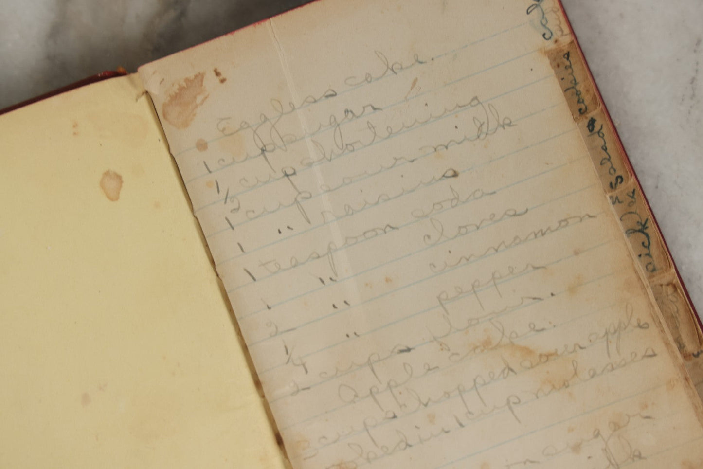Lot 275 - Vintage Handwritten And Compiled Recipe Book With Red Plastic Binding And Hand-Cut Tabbed Pages, Containing 30+ Recipes