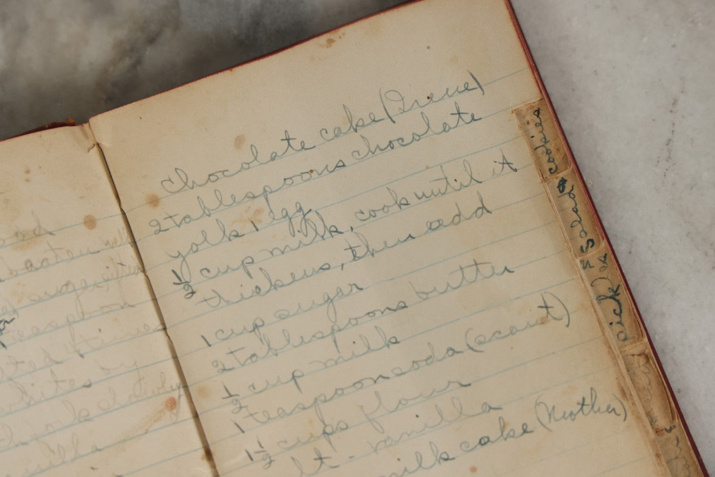 Lot 275 - Vintage Handwritten And Compiled Recipe Book With Red Plastic Binding And Hand-Cut Tabbed Pages, Containing 30+ Recipes