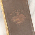 Lot 276 - "Boston Almanac 1861" Antique Illustrated Almanac Published In Boston, 1861, With Gilt Cover Design And Handwritten Monthly Memoranda, Note Poor Condition, Detached Covers