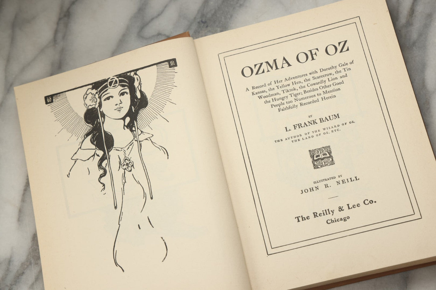 Lot 317 - "Ozma Of Oz" Antique Illustrated Fantasy Book By L. Frank Baum, Illustrated By John R. Neill, Published By The Reilly & Lee Co., Chicago, 1907
