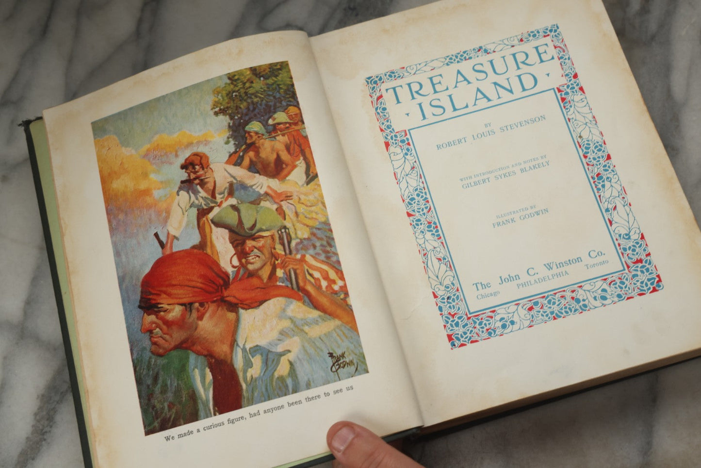 Lot 329 - "Treasure Island" Antique Illustrated Adventure Book By Robert Louis Stevenson, With Introduction And Notes By Gilbert Sykes Blakely, Illustrated By Frank Godwin, Published By The John C. Winston Co., Philadelphia, 1924