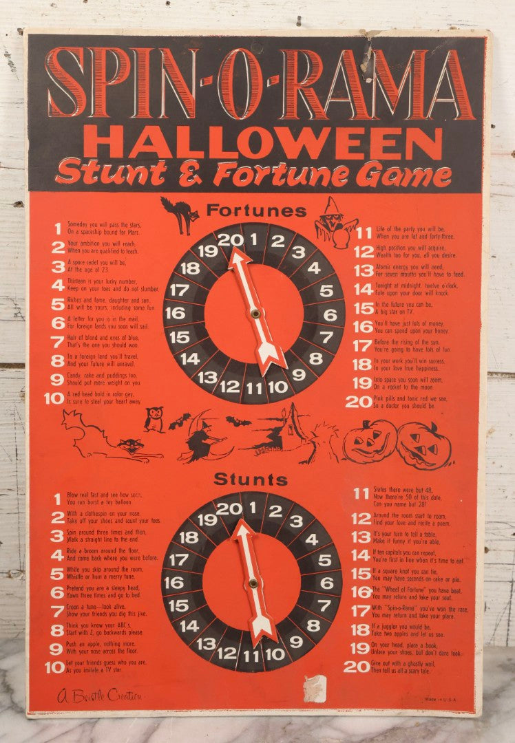 Lot 025 - Vintage Spin-O-Rama Halloween Stunt And Fortune Game By Beistle With Witch, Black Cat, And Jack-O-Lantern J.O.L. Graphics, Made In U.S.A.., 12-3/8" x 18-3/8"