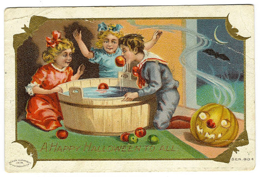 Lot 031 - Antique Illustrated Halloween Postcard “A Happy Halloween To All” Depicting Children Bobbing For Apples Beside Jack-O-Lantern, Design Copyright 1909 By M.W. Taggart, Series 804, Postmarked Elmira, New York, Written On Verso