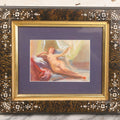 Lot 054 - Vintage Unsigned Watercolor Nude Of Woman On Colorful Linens Before Draped Backdrop, In Victorian Frame With Purple Mat, 14-1/8" x 12-1/8"