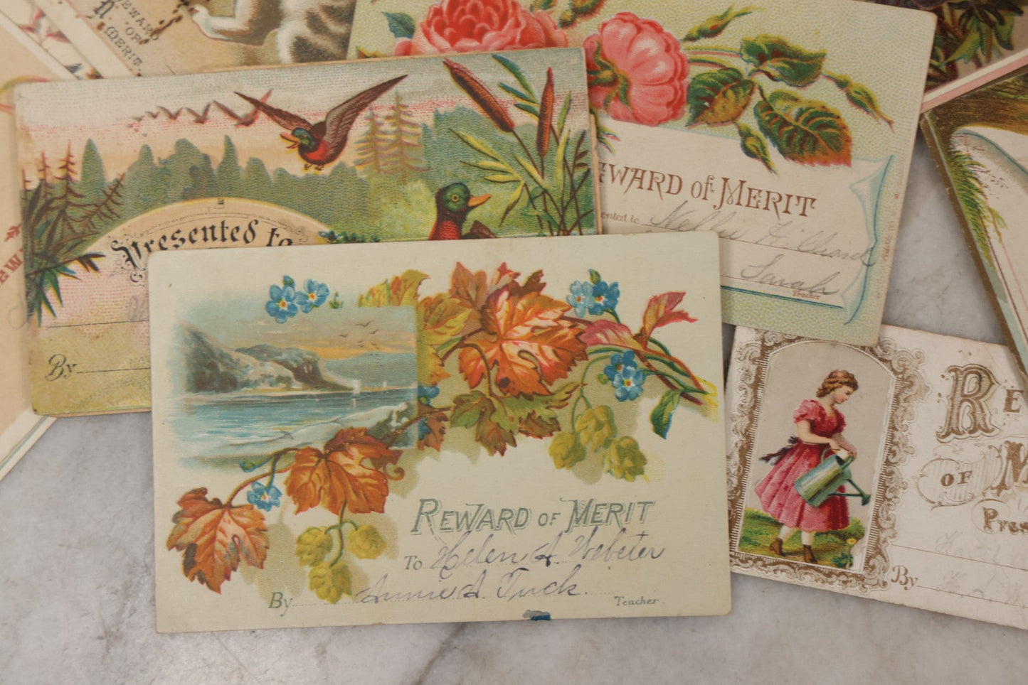 Lot 142 - Grouping Of 45+ Antique Rewards Of Merit With Chromolithograph Designs And Handwritten Inscriptions
