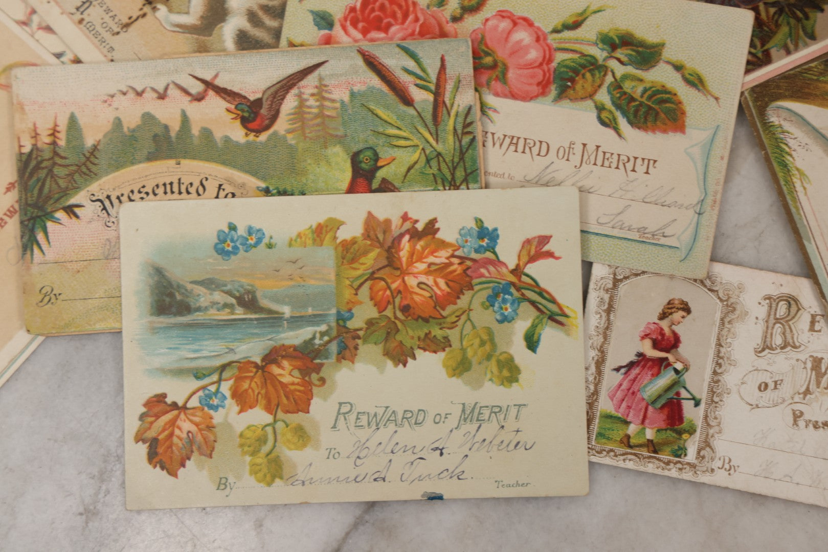 Lot 142 - Grouping Of 45+ Antique Rewards Of Merit With Chromolithograph Designs And Handwritten Inscriptions
