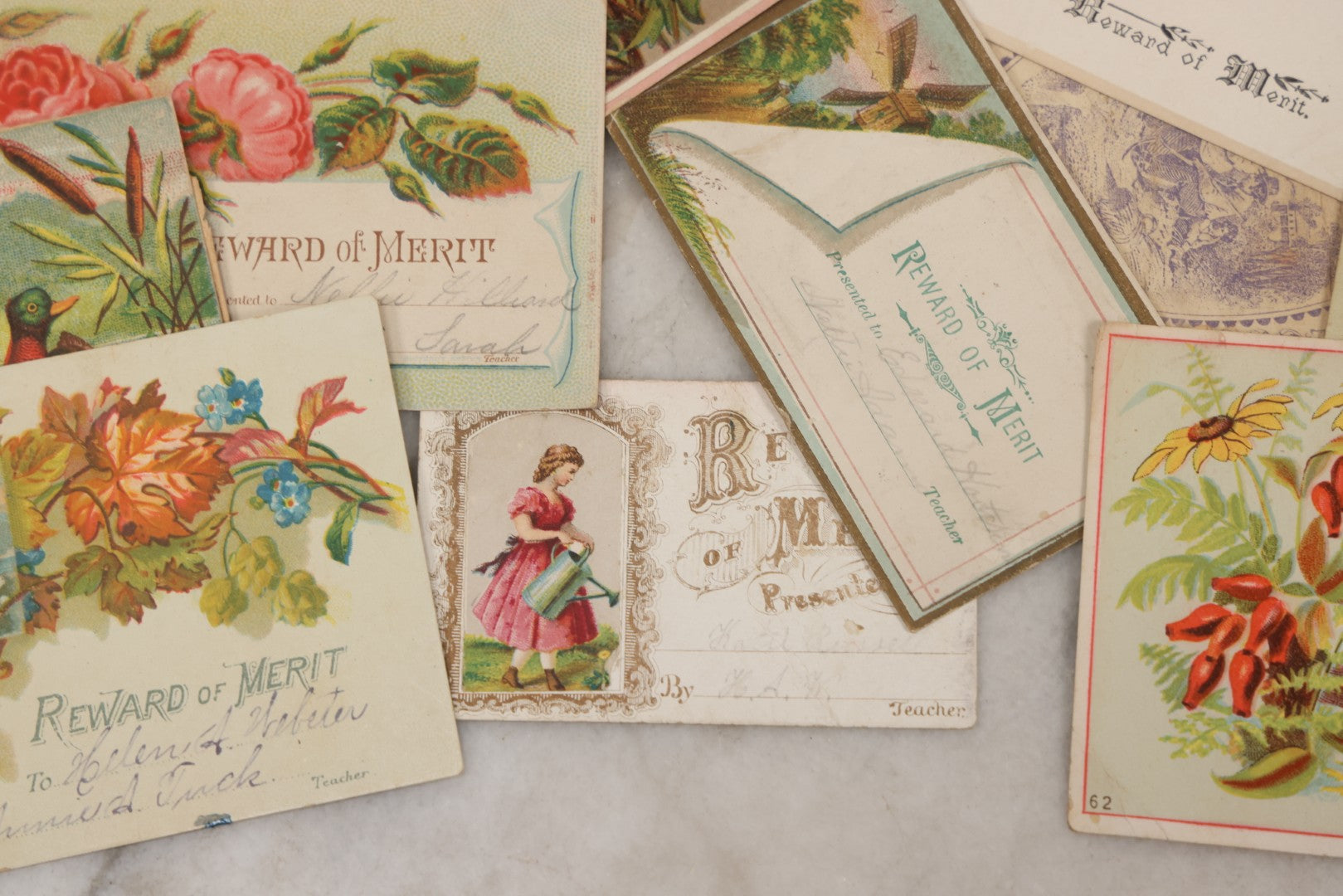 Lot 142 - Grouping Of 45+ Antique Rewards Of Merit With Chromolithograph Designs And Handwritten Inscriptions