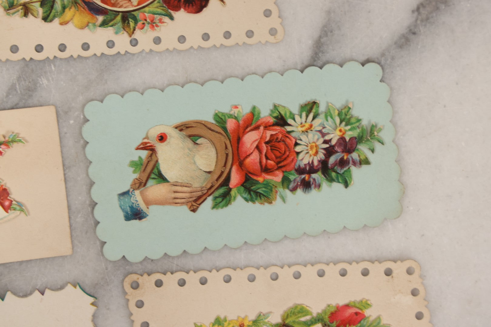 Lot 143 - Grouping Of 14 Antique Die Cut Chromolithograph Calling Cards With Hand, Bird, And Floral Motifs