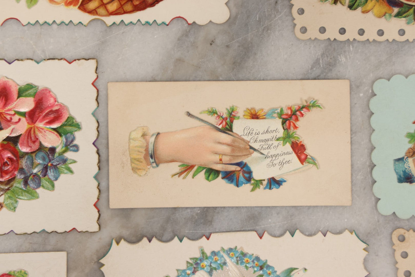Lot 143 - Grouping Of 14 Antique Die Cut Chromolithograph Calling Cards With Hand, Bird, And Floral Motifs