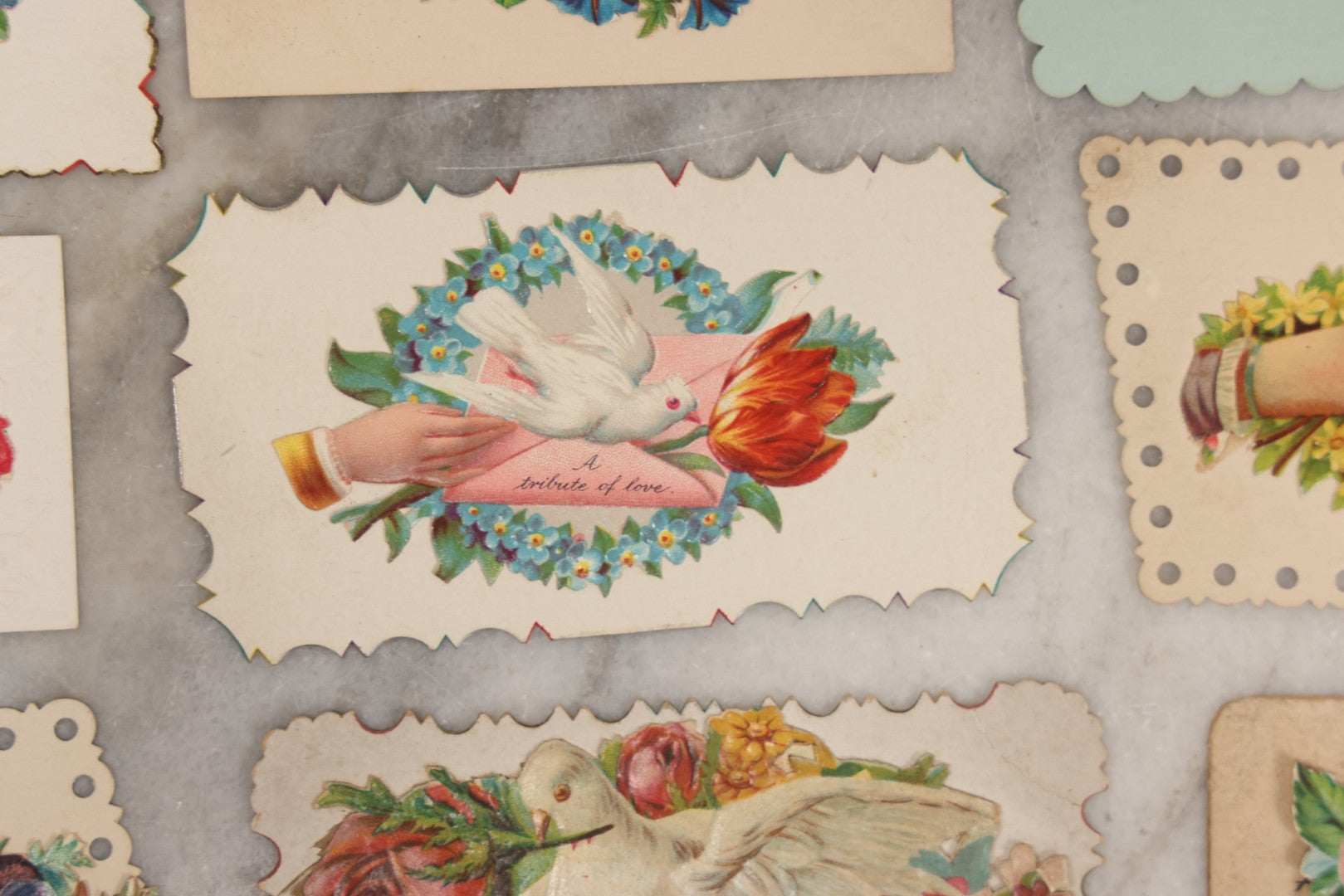 Lot 143 - Grouping Of 14 Antique Die Cut Chromolithograph Calling Cards With Hand, Bird, And Floral Motifs