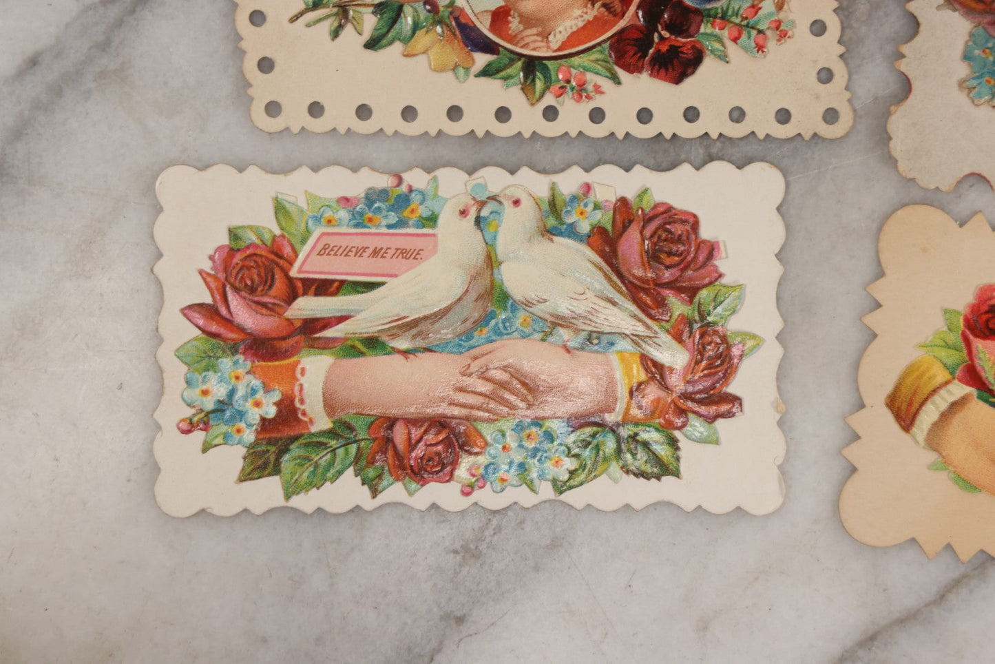 Lot 143 - Grouping Of 14 Antique Die Cut Chromolithograph Calling Cards With Hand, Bird, And Floral Motifs